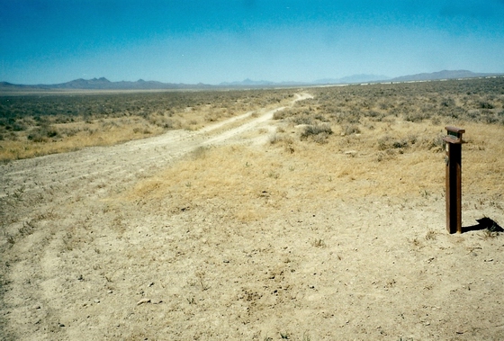 A RANCH ROAD GOES PAST MARKER C-70