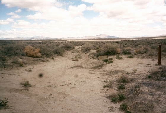 THE TRAIL GOES WEST PAST MARKER C-64